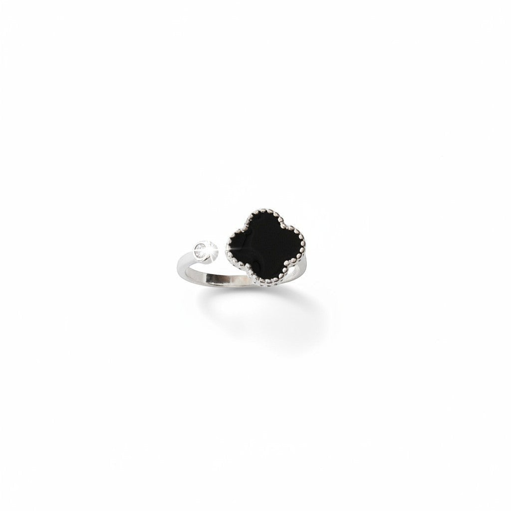 Hally Jewelry silver ring with black onyx four-leaf clover and cubic zirconia accent. Adjustable.